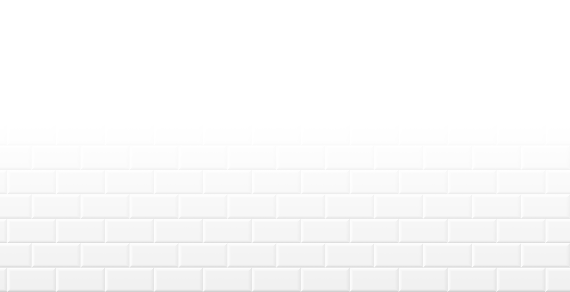 A white brick wall with a glossy finish, composed of evenly spaced tiles, creating a clean and minimalist appearance.