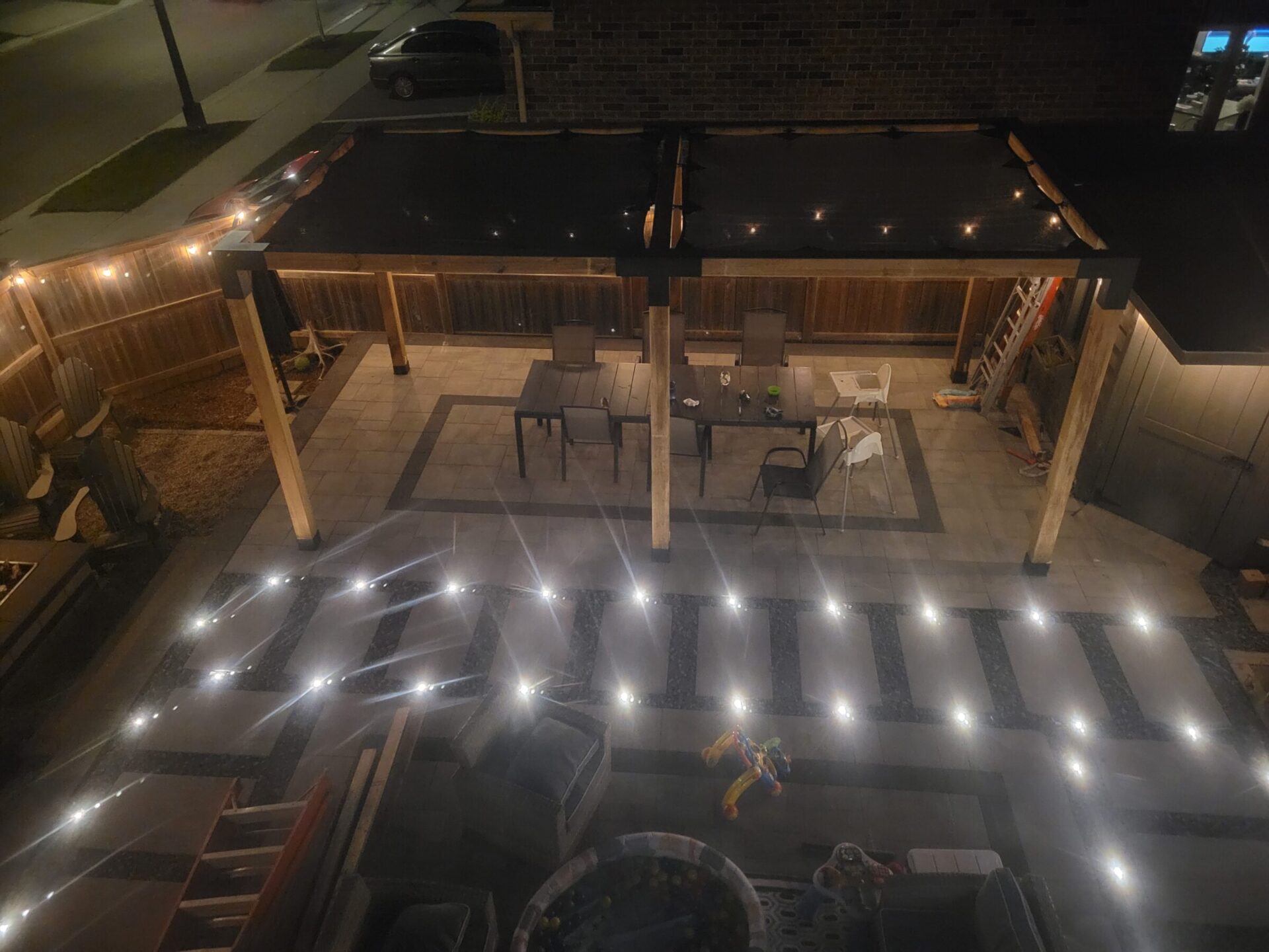 Lighted interlock pathways at night.