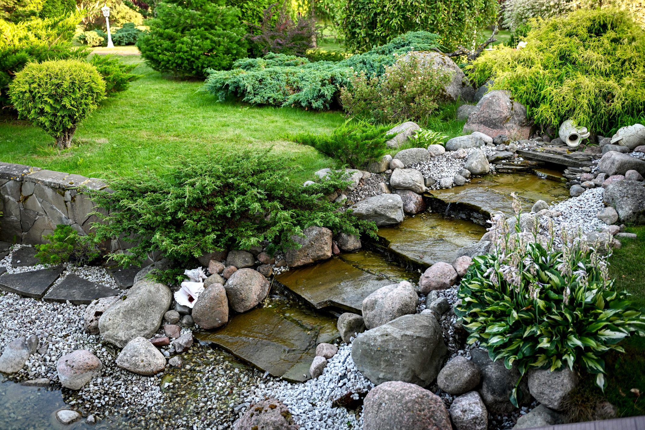 country house and garden and pond