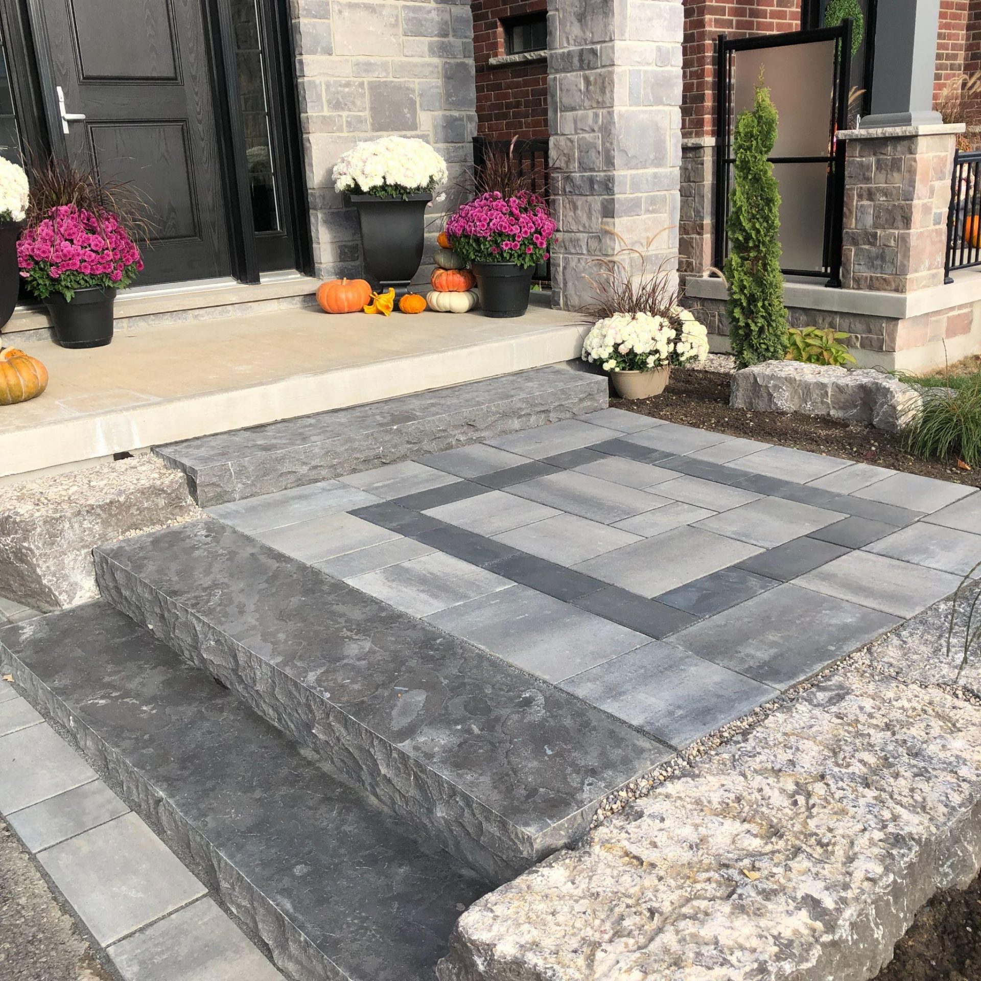 Modern front steps with grey interlock pavers