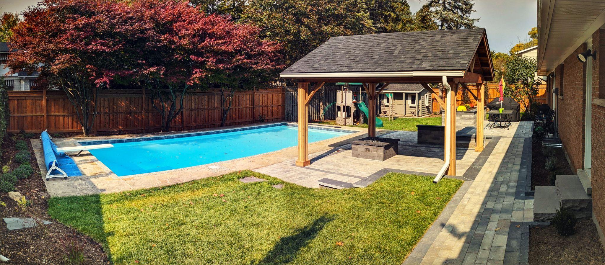Poolside interlock patio with covered pergola
